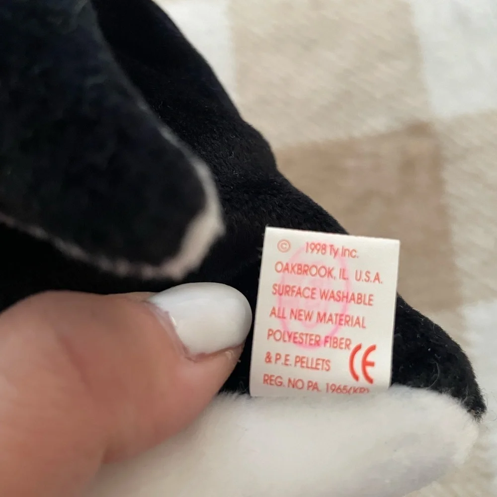 Ty Penguin Plush with Red Santa Hat named Zero 1998